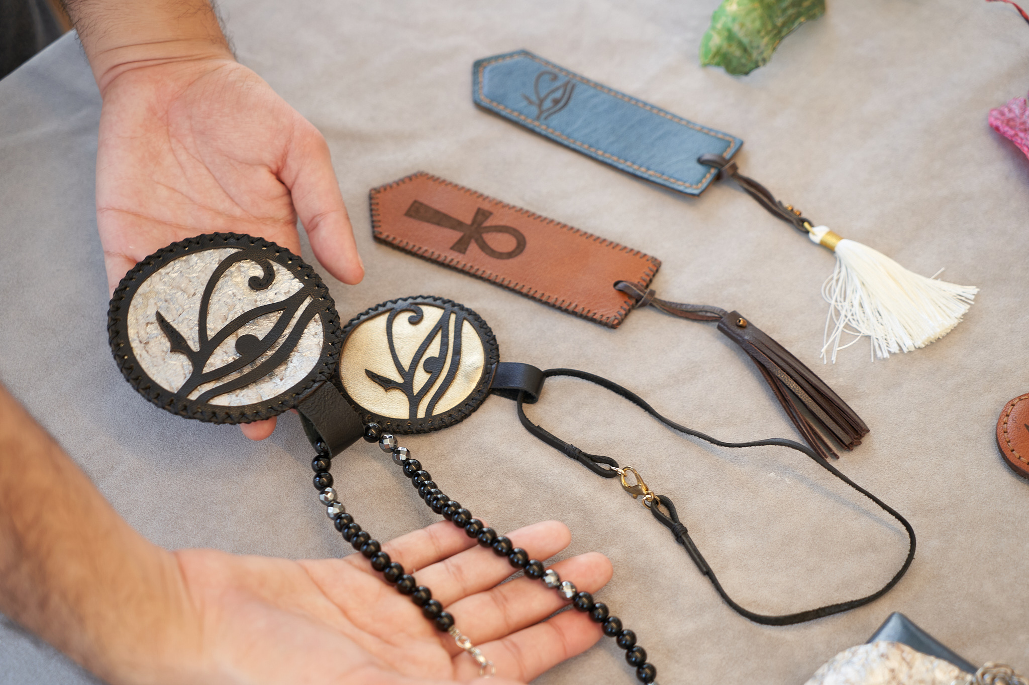 Small Visenleer accessories shown in the hand